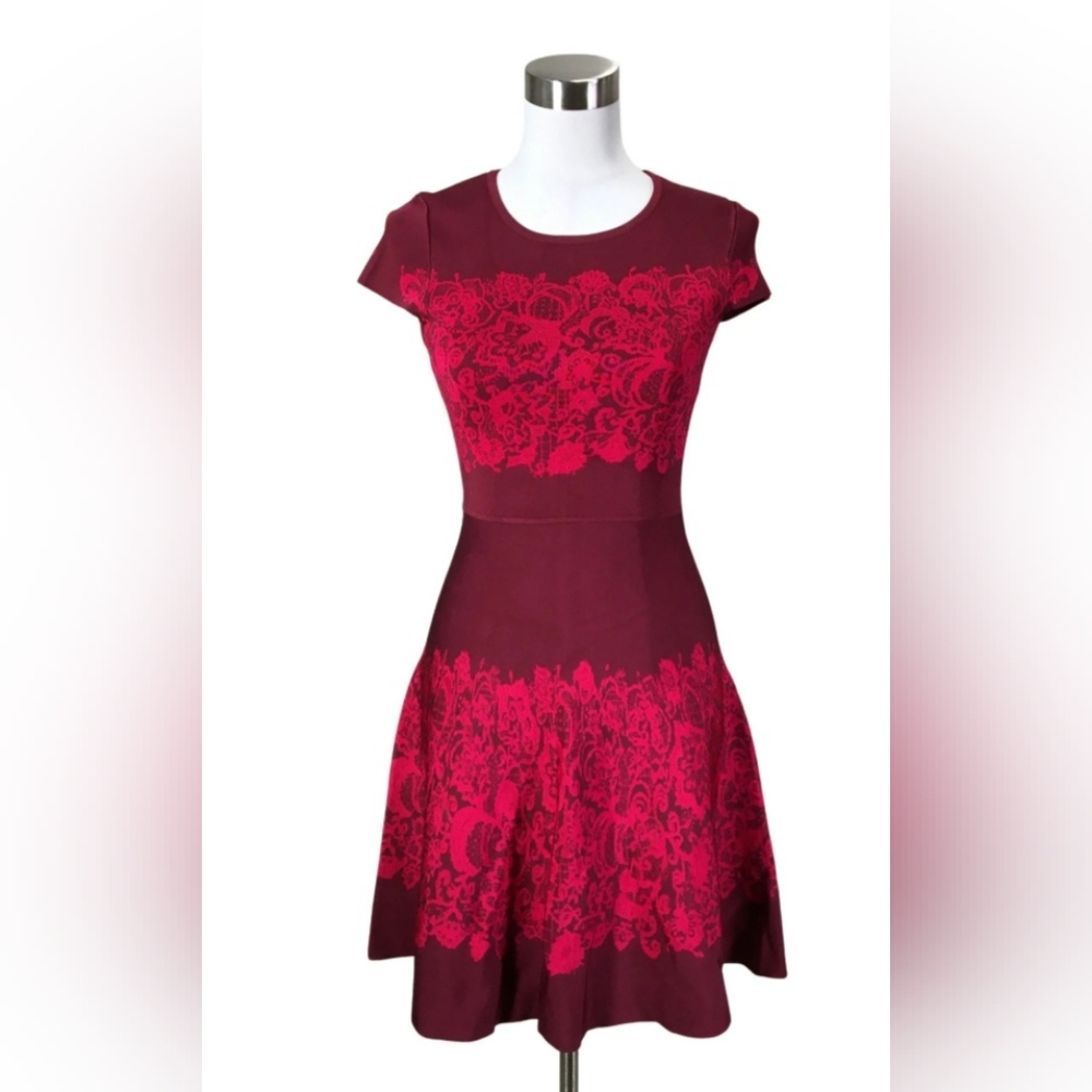 Dress by Karen Millen. Sz XS. Burgundy with red scroll floral designs.